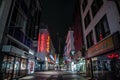 COLOGNE, GERMANY - NOVEMBER 6, 2022: Selective blur on Hohe Strasse street at night, with shops and stores closed, empty and Royalty Free Stock Photo